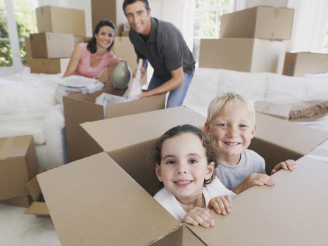 Organized storage space showing packed boxes and furniture for long-term keeping